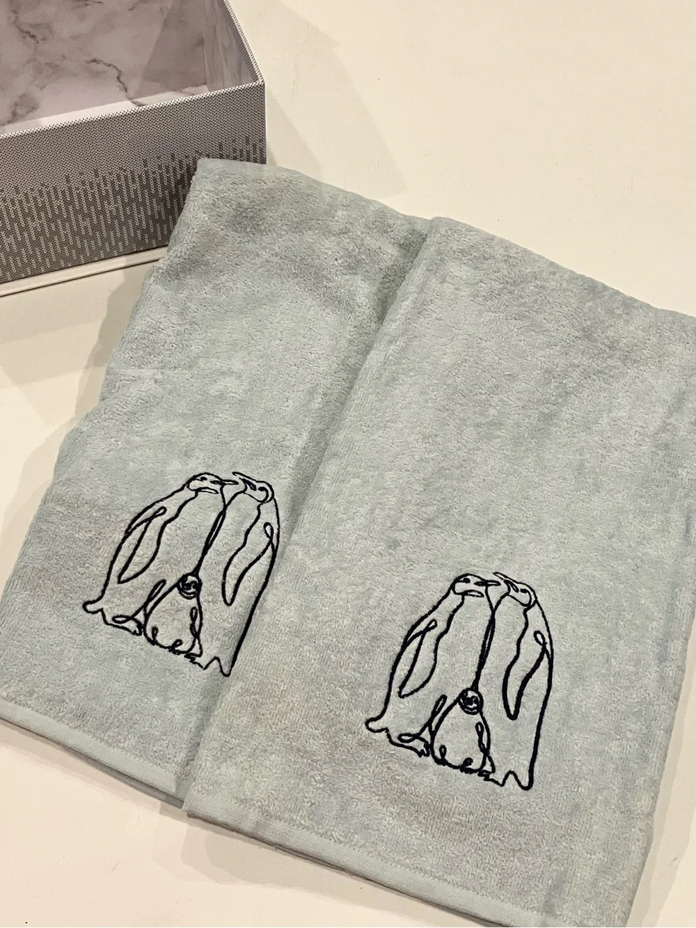 Light Blue Plush Throw with Embroidered Penguin Design